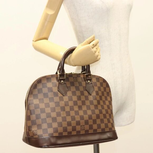 LOUIS VUITTON Damier Ebene Alma Hand Bag - Picture 13 of 15